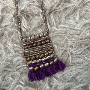 Noonday collection fair trade necklace made from artillery shells in Ethiopia